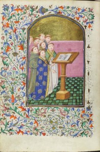 Monks singing from a lectern. Site Chant group Psallentes, dir. Hendrik Vanden Abeele